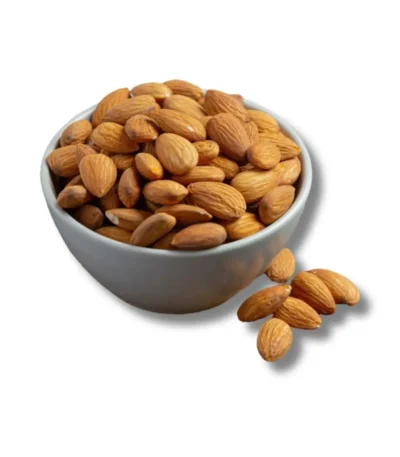 A grey ceramic bowl filled with whole raw almonds with a few scattered next to it